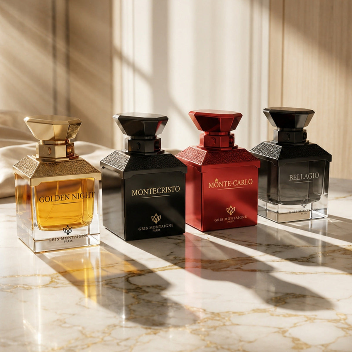 Collection de parfums Gris Montaigne Paris : Golden Night, Montecristo, Monte-Carlo et Bellagio présentés sur un marbre lumineux.